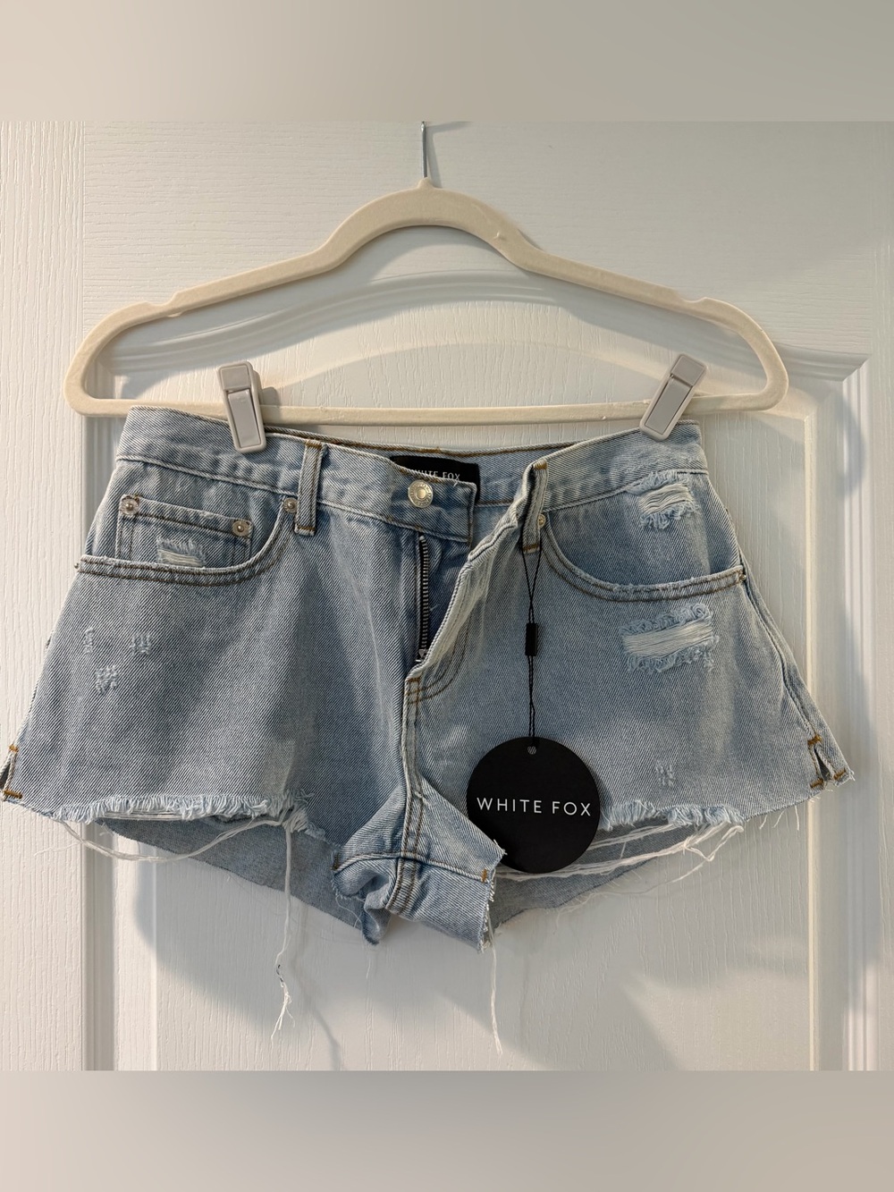 White Fox Boutique Light Wash Distressed Denim Cutoff Shorts